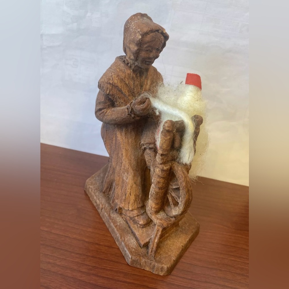 Antique Black Forest Germany wooden old woman with spinning wheel figure‎